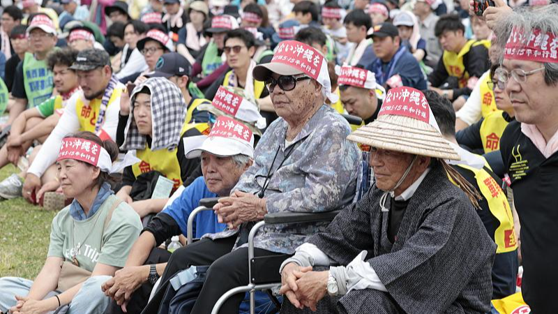 People stage a rally calling for reducing the burden on Okinawa from hosting U.S. forces in the Okinawa Prefecture city of Ginowan, southern Japan, May 18, 2024. /VCG