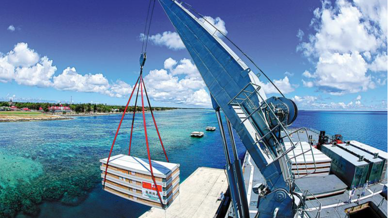 Relief supplies are unloaded in Tonga from a Chinese naval vessel after the Pacific island nation was hit by a volcanic eruption and tsunami in January, 2022. /Xinhua