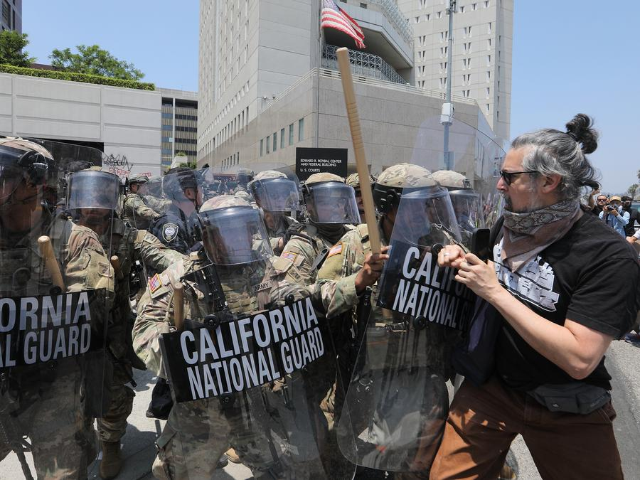 The California National Guard soldiers confront protesters in front of the Los Angeles Federal Detention Center, in Los Angeles, California, the United States, June 8, 2025. /Xinhua